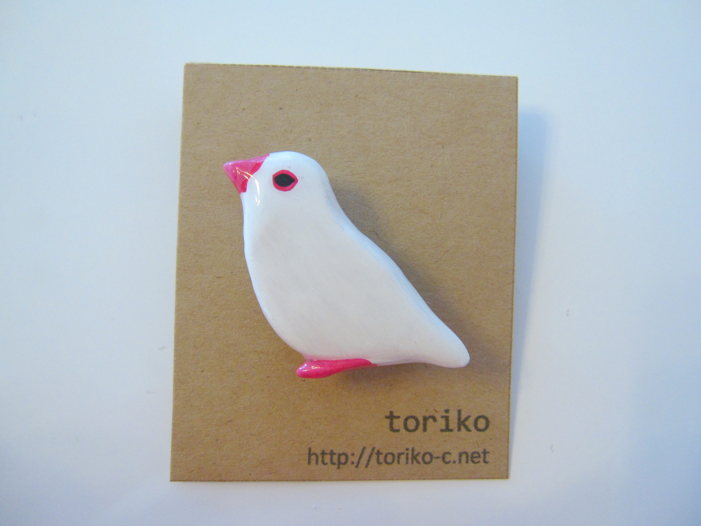 白文鳥のレジン加工ブローチ 左向きを仕入れる | ECモールに無い商品の